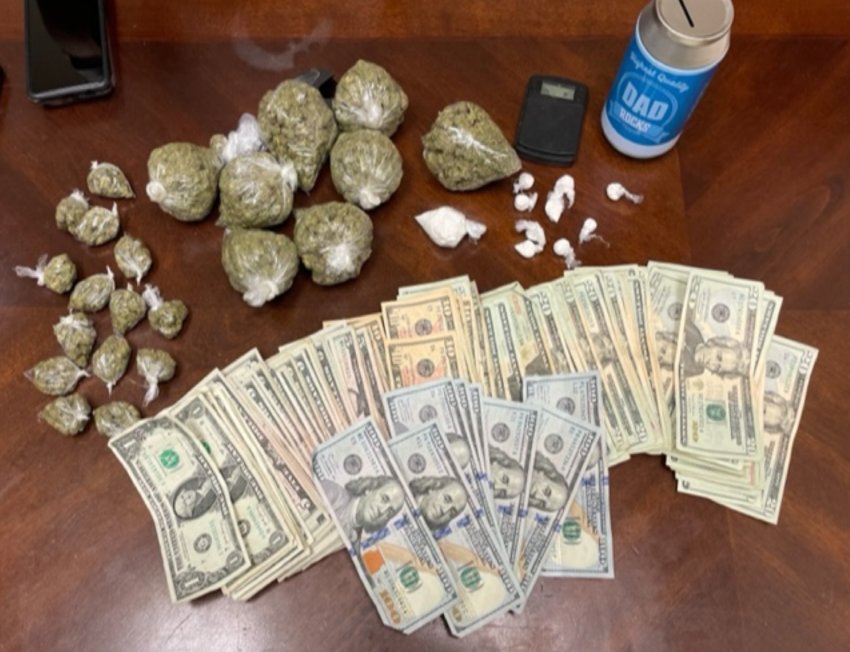 Drugs and cash were seized when police served their warrant on Davis.